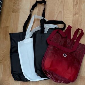 lululemon athletica Black, White, and Red Tote Trio